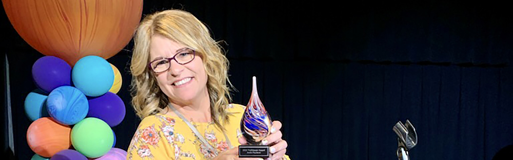 Image: Amie Paulson with her Personalized Learning Award